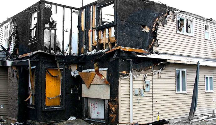 House severely damaged by fire House structurally damaged by fire