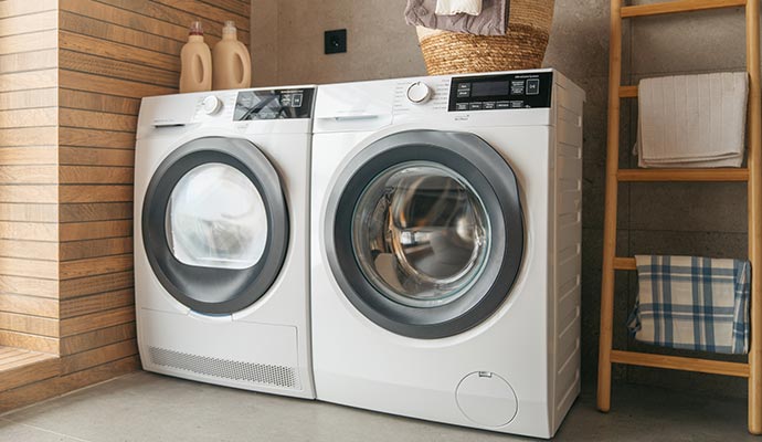 Washing machine Clean washing machine in a room