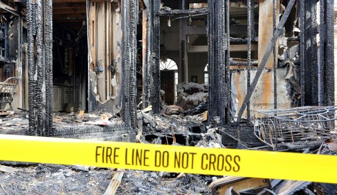 Property severely damaged by fire Property severely damaged by fire