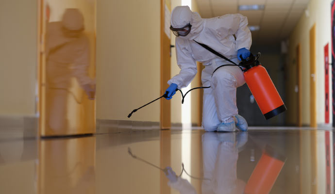 A person working on containment service