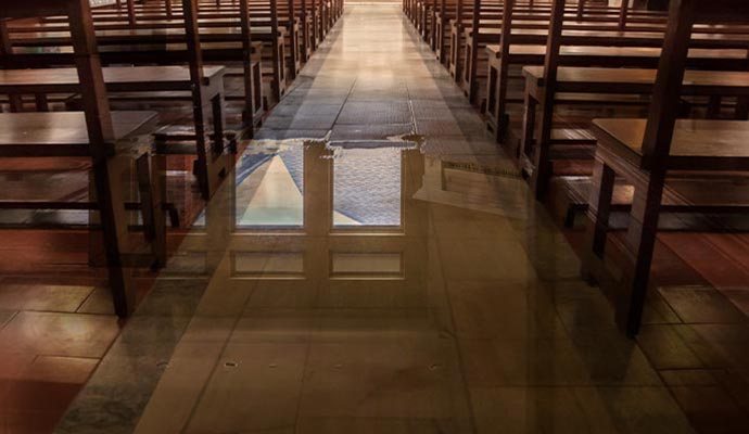 Water-damaged interior of a worship space Water-damaged interior of a worship space