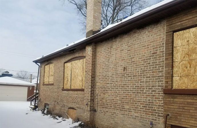 Boarded-up building windows