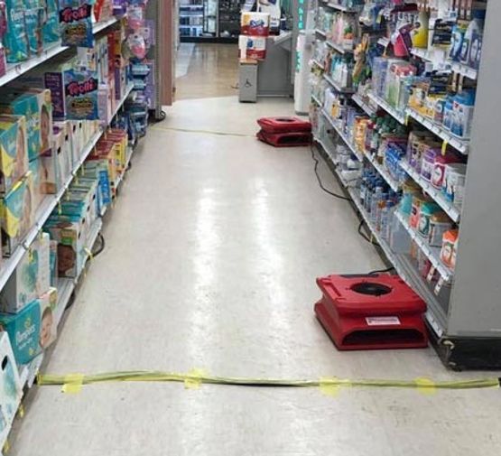 Drying water-damaged floor Drying water-damaged floor with professional equipment